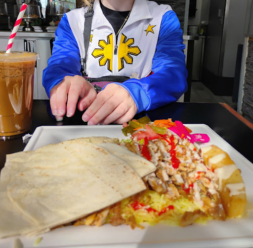 Photo of Aladdin Café - 615 Robson St, Vancouver, BC V6B 5J3